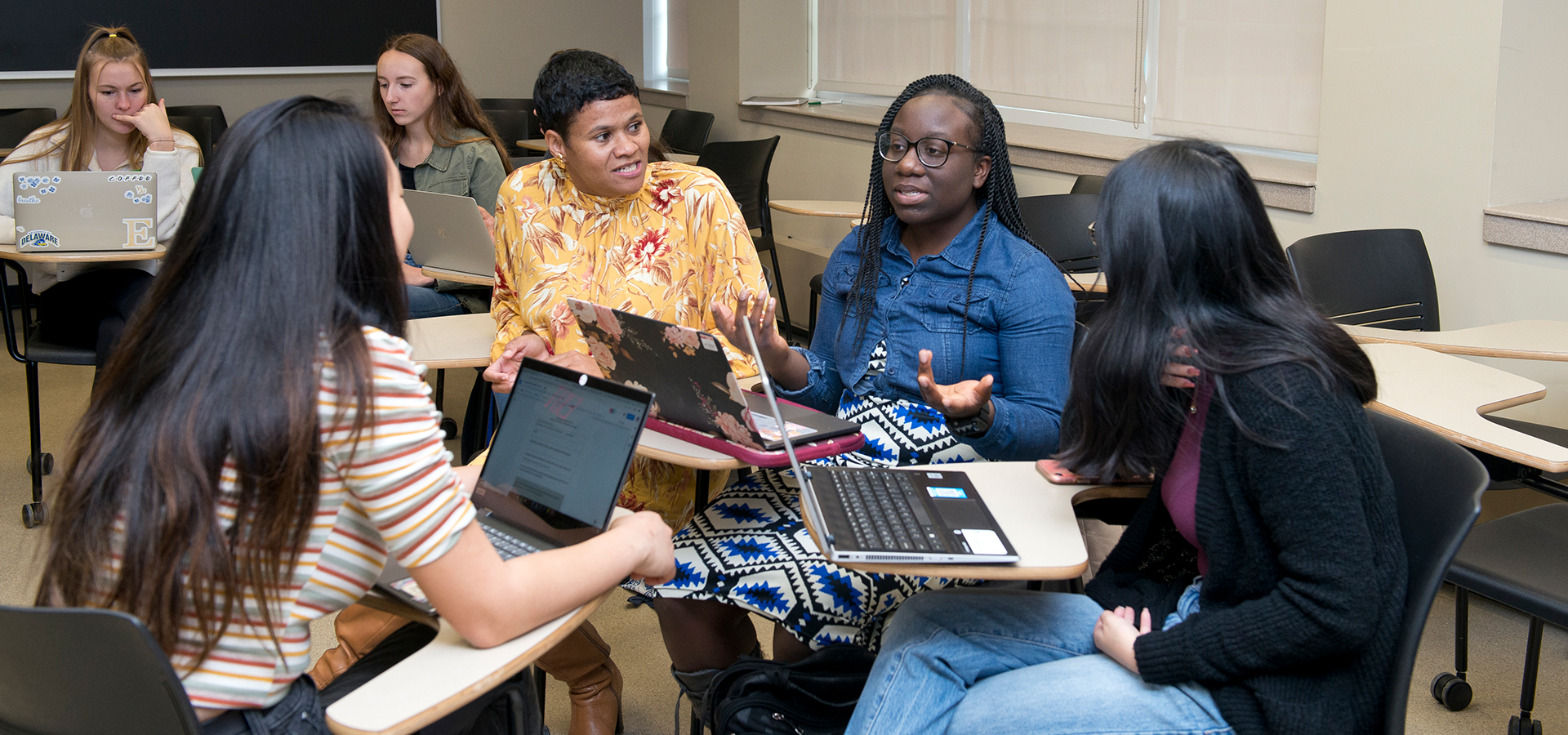 Janine de Novais speaks with students in her racial literacy class